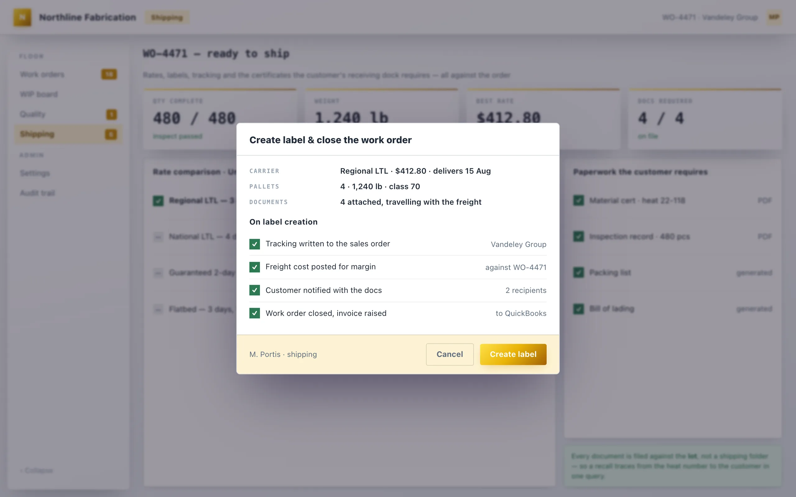 A manufacturing shipping screen for a completed work order comparing four carrier rates, listing the four required documents already on file, and a modal showing what happens on label creation including tracking write-back and invoice.